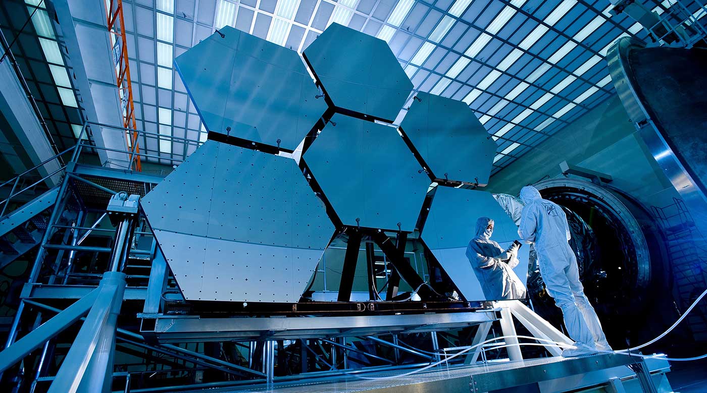 Engineers working on a group of solar-panels