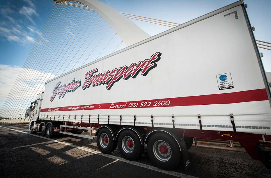 Photograph of a Goggins Transport truck crossing the Samuel Beckett bridge in Dublin