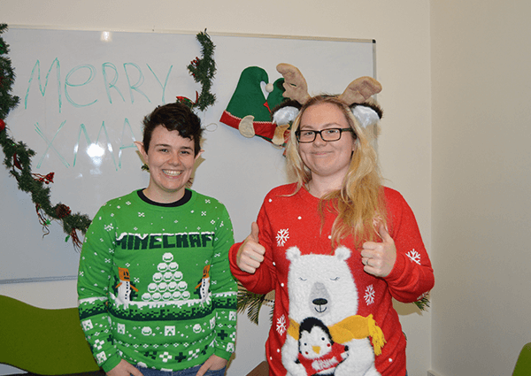 Riley & Abby wearing Christmas jumpers