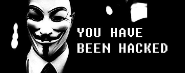 Man wearing Guyfawkes mask with the text 'You Have Been Hacked'